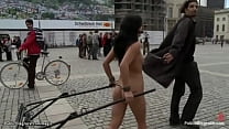 Naked Romanian slave Amabella gets wrists cuffed and chained together made to pull chariot in public square then fucked in the park by big dick Zenza Raggi